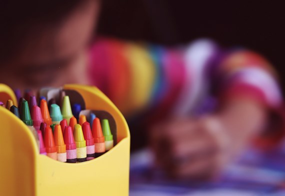 picture of a child using crayons